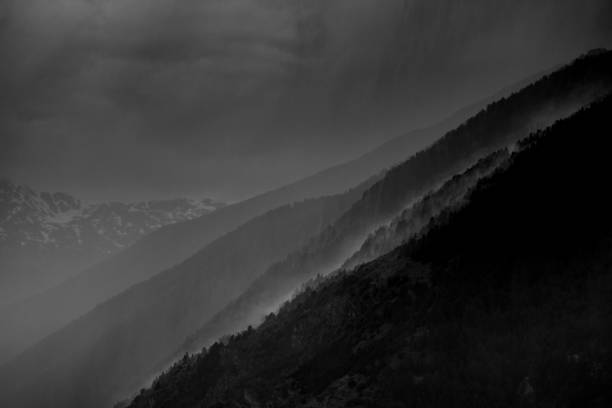 istock Alpine landscape in heavy rain 2160734537