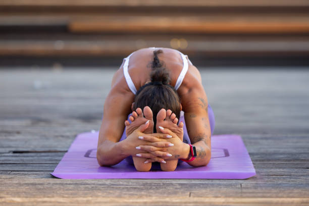 istock Beautiful woman practicing yoga 2160735288