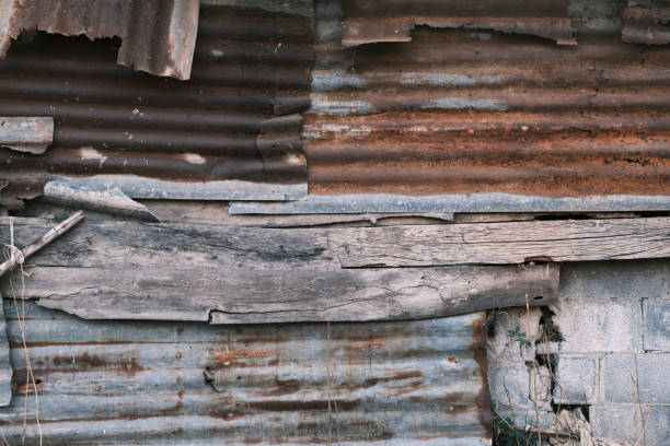 istock Old wall with zinc rusting with old wood 2160737343