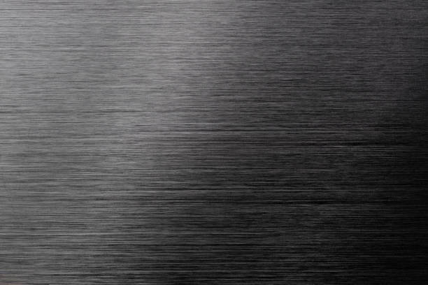 Close up of black Brushed metal. This file is cleaned and retouched.