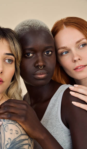 istock Three cool pretty young women looking at camera, beauty vertical shot. 2160743106