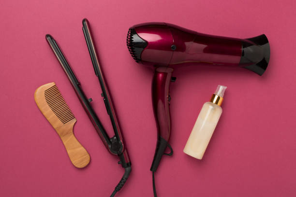 istock Hair tools with thermo protection on color background, top, view 2160744591