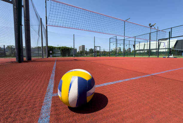 istock volleyball ball with blurred arena in background. 2160747340
