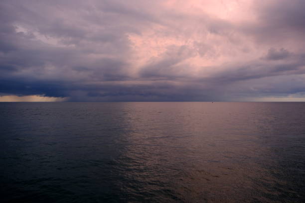 Dramatic stormy sky over the sea. Nature composition. Dramatic sky with storm clouds.