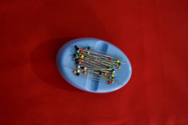 Colorful thumbtacks close up for background
