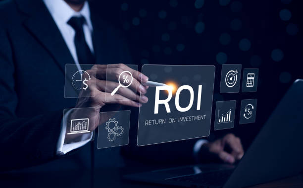 istock ROI, Analyzing Return on Investment Concept. Businessman with digital icons representing ROI analysis, graphs, percentages, and financial symbols, emphasizing investment strategy, financial management 2160751450