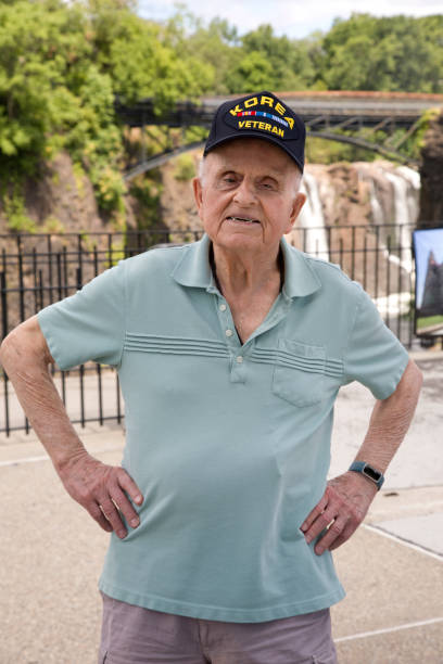 istock Korean War Veteran standing looking at camera 2160757730
