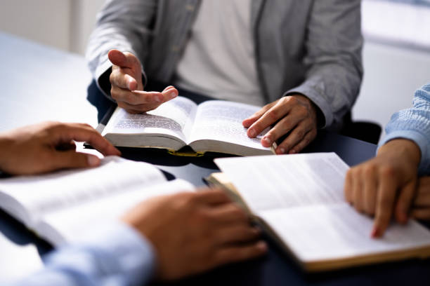 istock Christian Preacher Leads Bible Study With Friends, Spreading Faith 2160759549