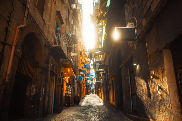 Classic narrow Italian street backlight at sunsetQuartieri Spagnoli (Spanish ward) in Naples, Italy