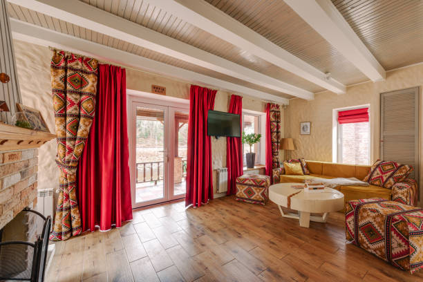 istock Imagine yourself in a warm and inviting living space with rustic decor and cozy red curtains 2160760142
