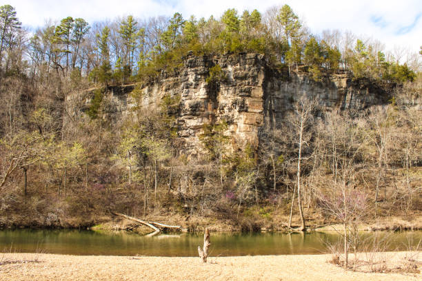 A rock bluff/cliff sticking out along the Jack's Fork River in Southern Missouri. Ozark National Scenic Riverways.