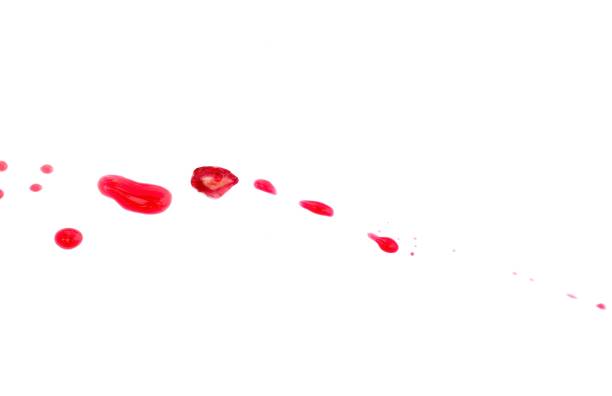 Pomegranate Seed Juice Stain Isolated on White Background with Copy Space