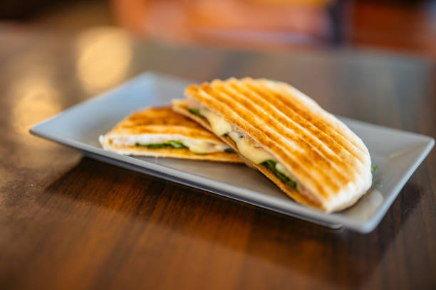 Toasted sandwich served on a table in the pub.