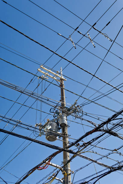 istock A power line pole with wires hanging from it. 2160765079