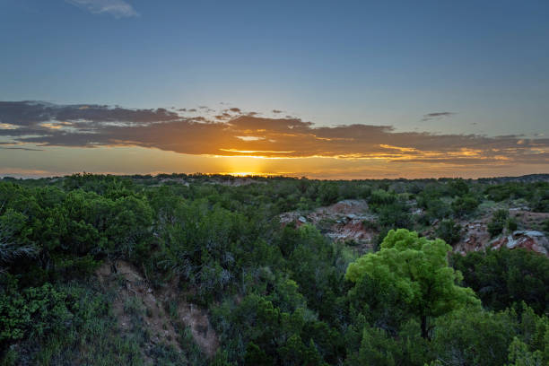 istock sunset over land in Texas 2160772195