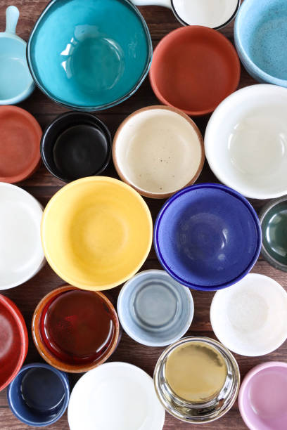 istock Close up image of mixed colourful side dishes, dip bowls, different shapes and sizes, for dips, chutneys and relishes 2160774042