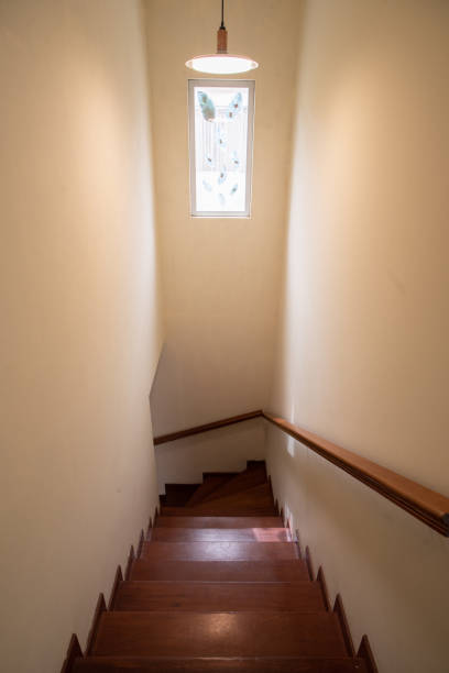 istock Duplex apartment staircase with wood finishes 2160780492