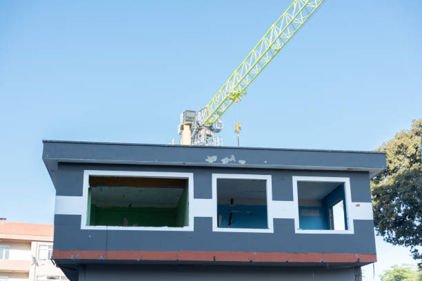 istock High building construction crane. Construction crane with blue sky background 2160783037