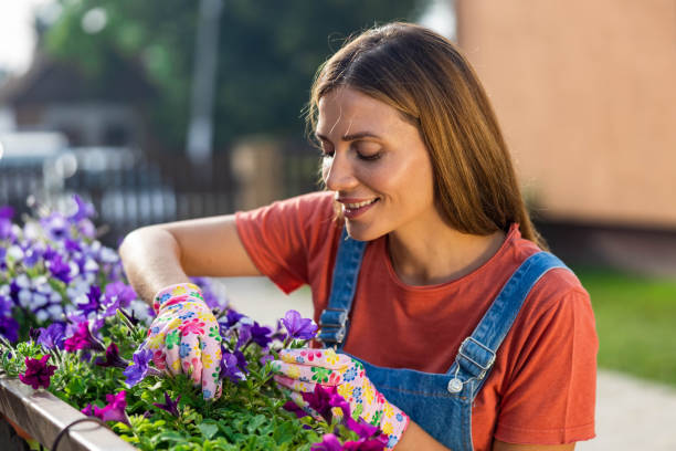 istock woman and flowers 2160791335