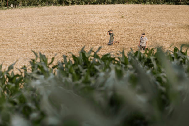 istock Two hunters searching a field 2160792972