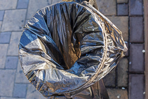 istock empty trash bag in a trash can on the street. Cleaning 2160796181