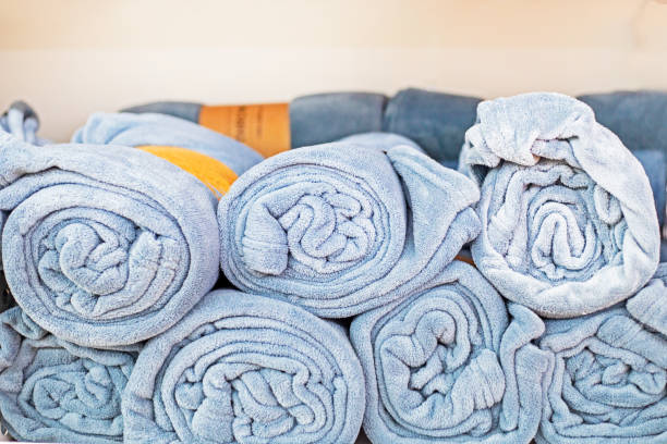 istock folded gray light blanket on a counter in a supermarket 2160796506