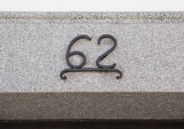 House number 62. Iron over granite lintel