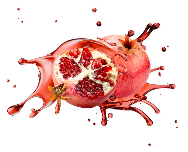 istock pomegranate in juice splash isolated on a white background. Clipping path. 3d rendering 2160807642