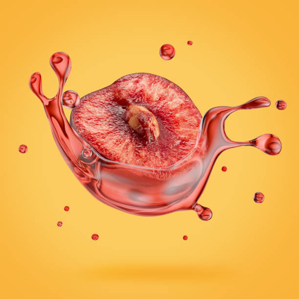 sweet cherry half  with juice splash on a light orange background
