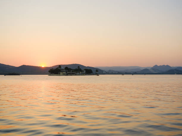 Scenic view of Udaipur architecture at Lake Pichola at sunset