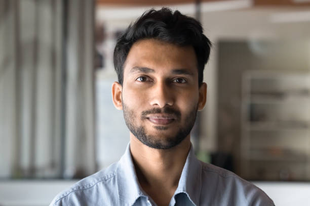 istock Positive handsome young Indian man head shot front portrait 2160830783