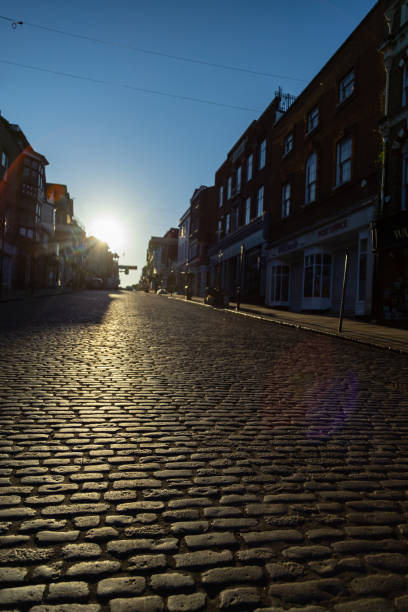 Early morning sunlight in Guildford famous high street cobbles road Surrey England Europe