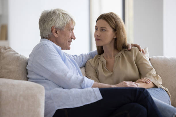 istock Conversation of older man and millennial daughter 2160836997