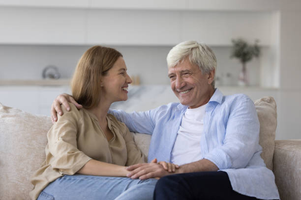 istock Smiling aged man spend leisure with millennial loving daughter 2160837209