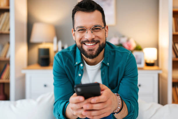 istock Handsome young man enjoying in video chat 2160838816