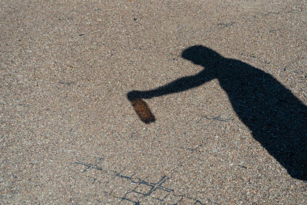 istock Man Drinking Water Silhouette, Drinking from Bottle Shadow in Bright Hot Sun, Heatwave Prevention 2160841741