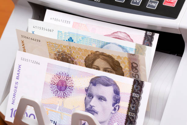 istock Norwegian crown in the counting machine 2160844622