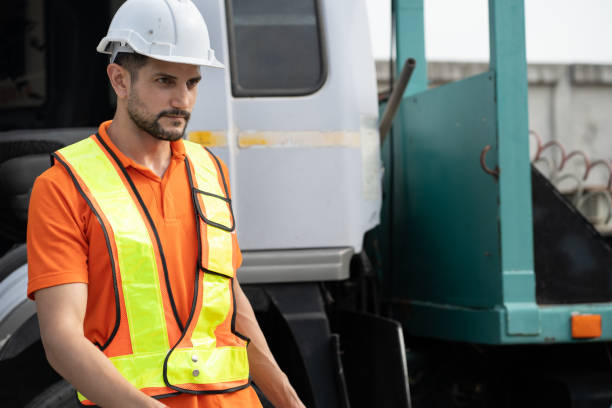 istock Portrait Hispanic latin engineer man with truck at construction site 2160845540