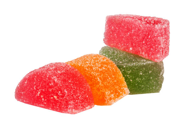 istock Colorful candied fruit jellies isolated on white background 2160847062