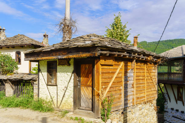 Dolen, Bulgaria - September 29, 2023: View of typical houses in the village Dolen, Rhodope Mountains, Bulgaria