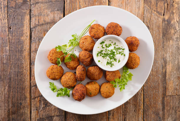 istock fried falafel with dipping sauce 2160850297