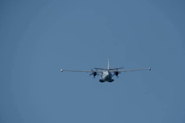 istock Twin-engine short-range transport aircraft in the cloudy sky. 2160854144
