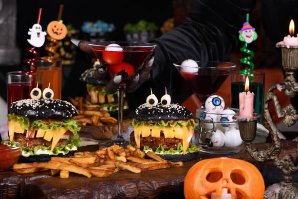 istock Witch's cocktail with eyeballs in a martini glass 2160855316