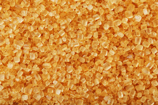 istock Texture of golden sand on the beach with a solid background in full screen 2160858124