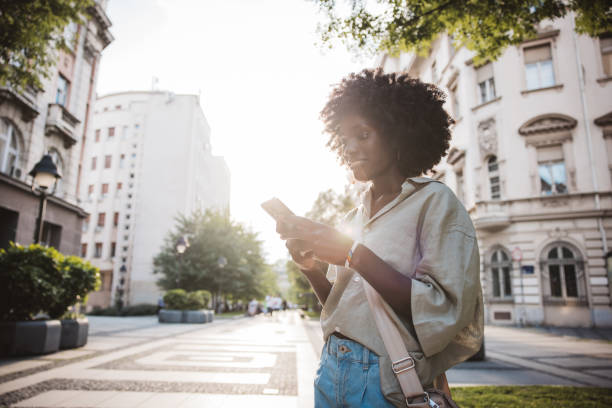 istock Young woman exploring city 2160861982