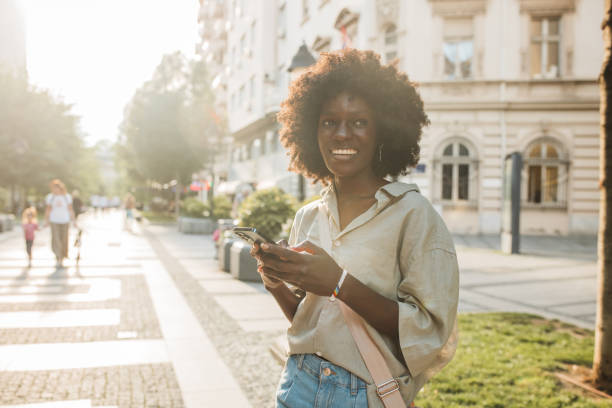 istock Young woman exploring city 2160862111