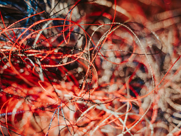 istock Chaotically tangled threads. Embroidery threads randomly woven. Huge knot. Extreme macro. Beautiful story for intro. Title credits. Abstract screensaver. Handicraft concept, entropy, disorder measure 2160863049