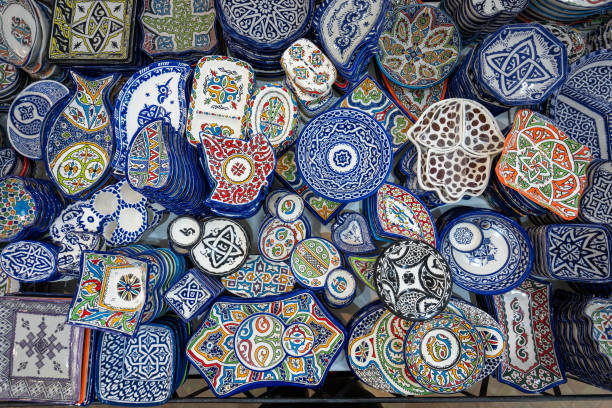 Fes, Morocco - March 23, 2024: Exquisite Moroccan ceramic plate showcasing traditional craftsmanship. A glimpse into the detailed process from molding to decoration.