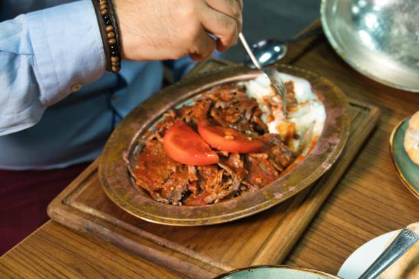 istock Person Eating Turkish Food in Restaurant 2160868332