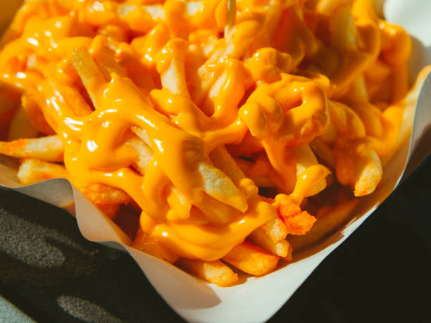istock cheese French fries 2160870221